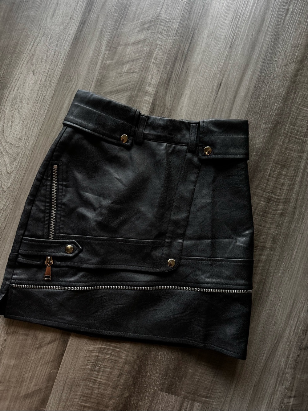 Faux Leather Black Mini Skirt with Zip and Snap Accents